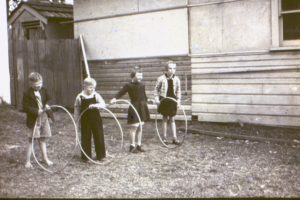 Kids and hoola hoops 1940s