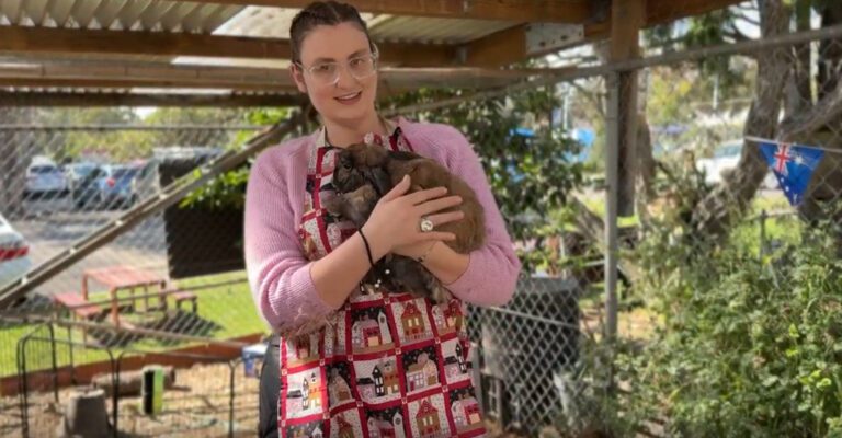 Katrina at Garden House cuddling a rabbit