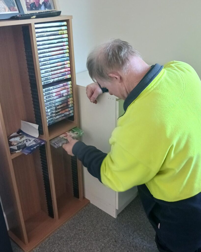 Cappy unpacking his DVDs