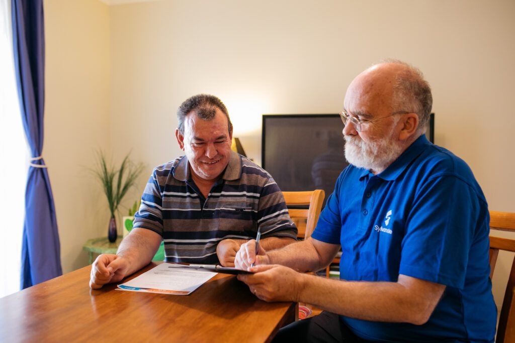 Behaviour support manager speaking with participant