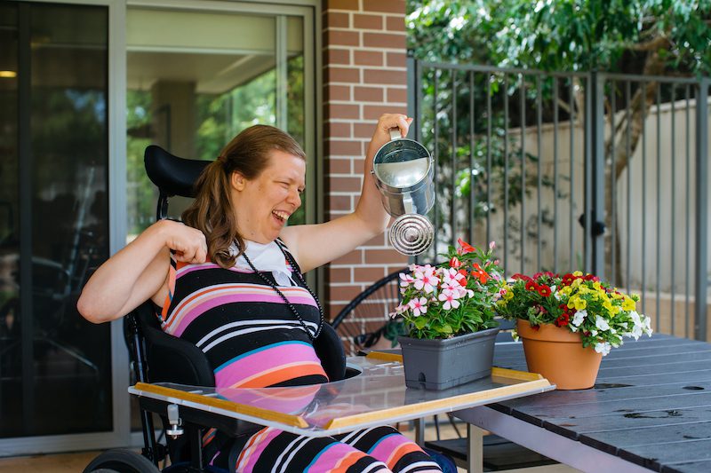 Ashleigh watering plants